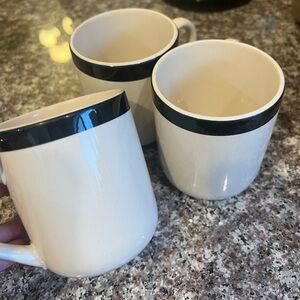 Set of Three Cream Mugs with Black Trim
